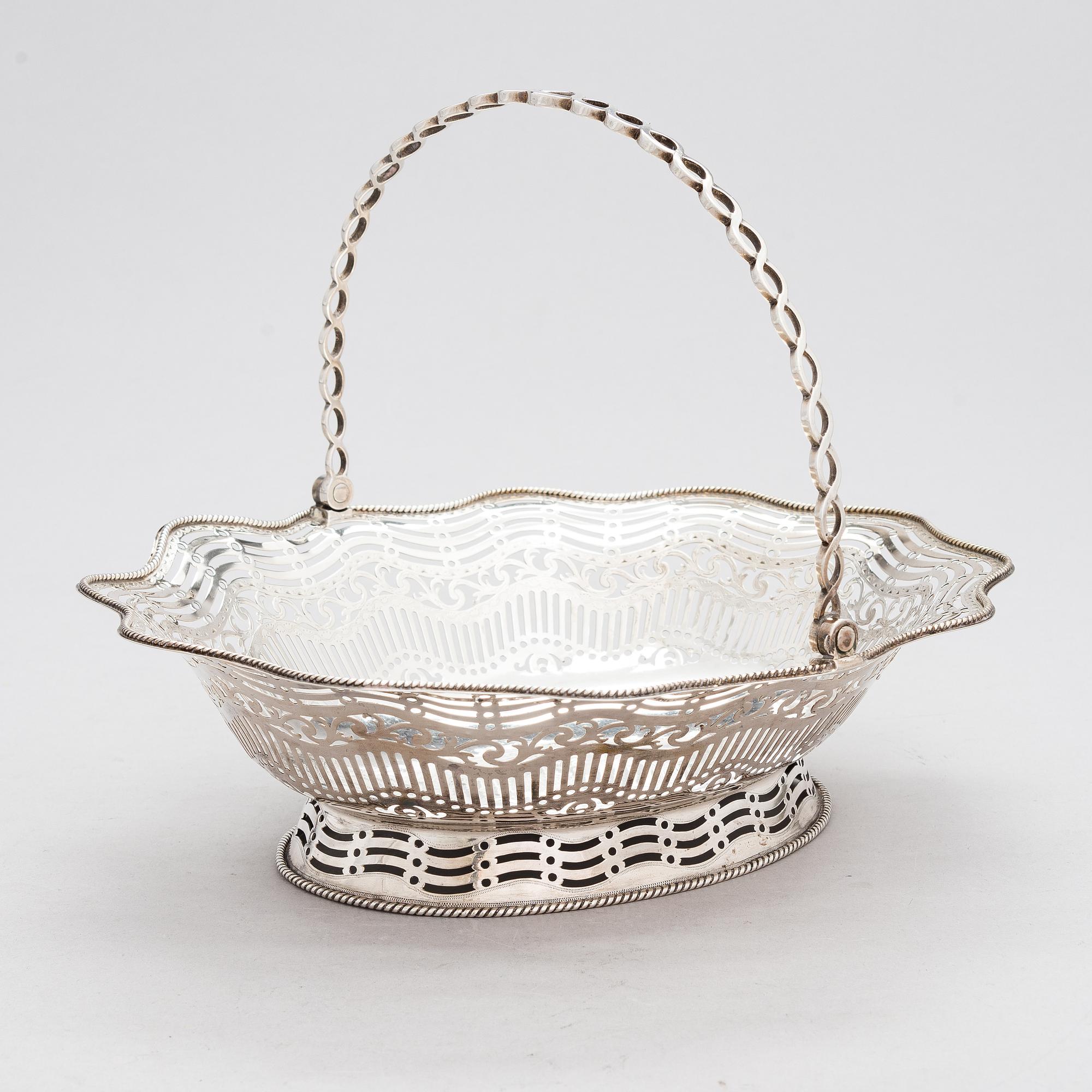 A George III sterling silver breadbasket, maker's mark of William Plummer, London 1777.