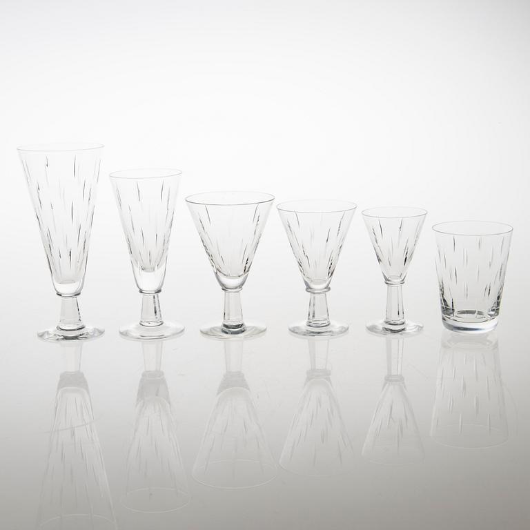 SAARA HOPEA 71-piece Inari crystal stemware set for Nuutajärvi. Designed in 1953.