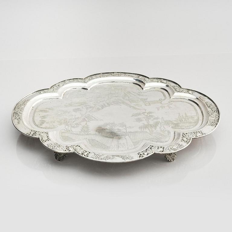 A lobed silver tray on four feet, Shanghai, Singfat, China Trade.