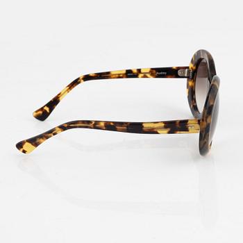 Oliver Goldsmith, a pair of "Audrey" sunglasses.