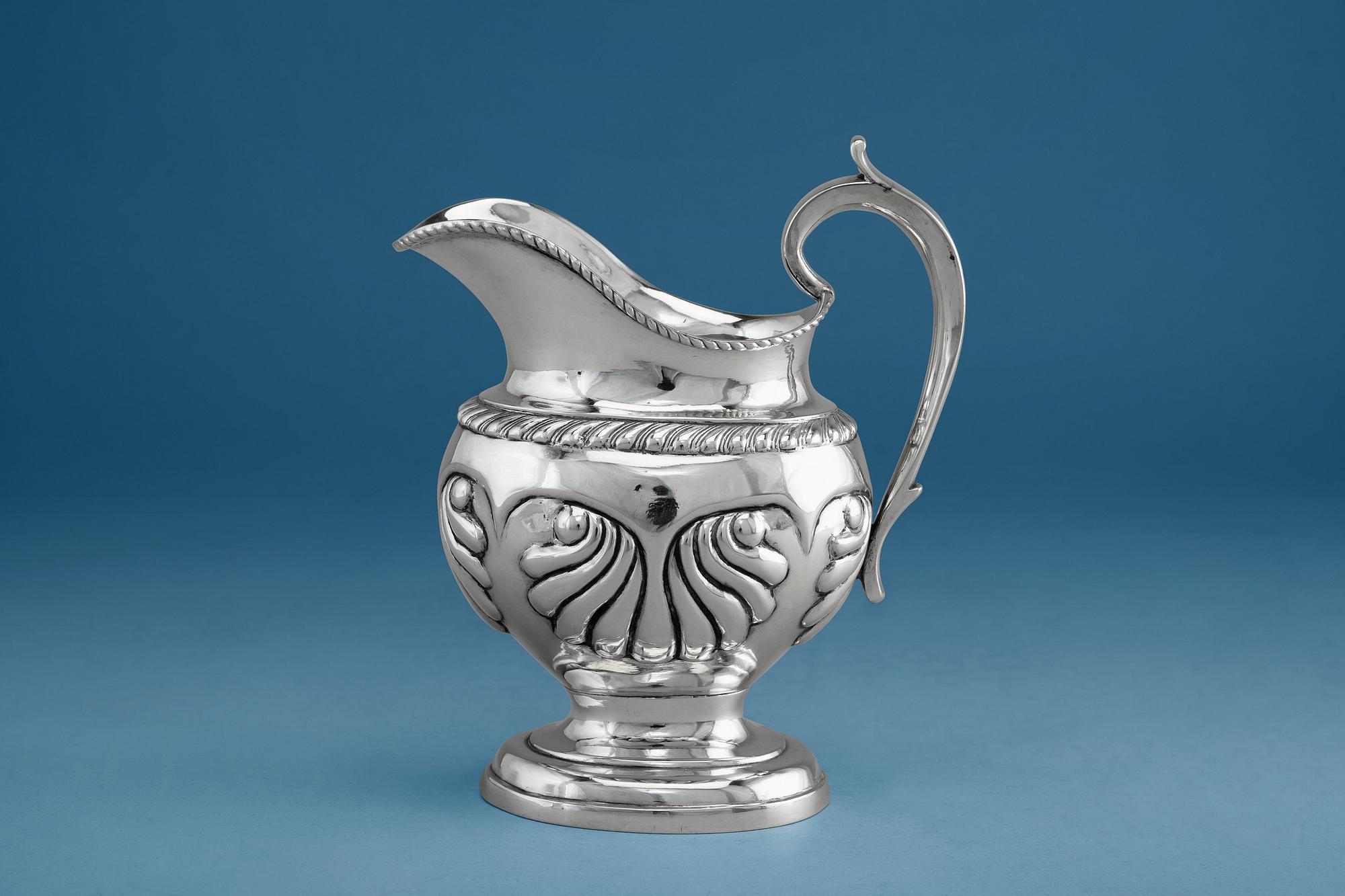 A CREAMER, silver. Roland Mellin Helsinki 1838. Height 12 cm, weight 132 g.
