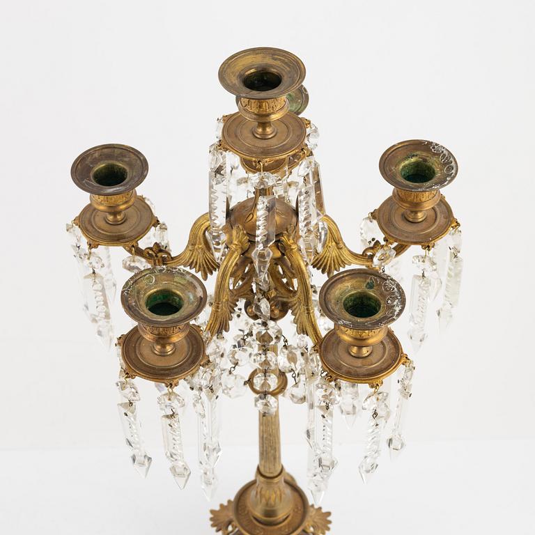 A pair of bronze candelabra, late 19th Century.
