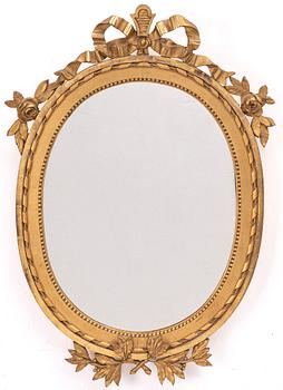 A Gustavian style mirror, early 20th century.