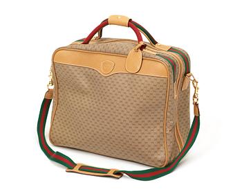 629. A weekend bag/ travelling bag by Gucci.