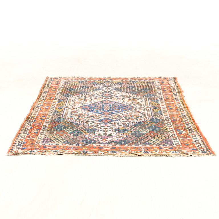 Semi-antique oriental rug, approximately 204x140 cm.