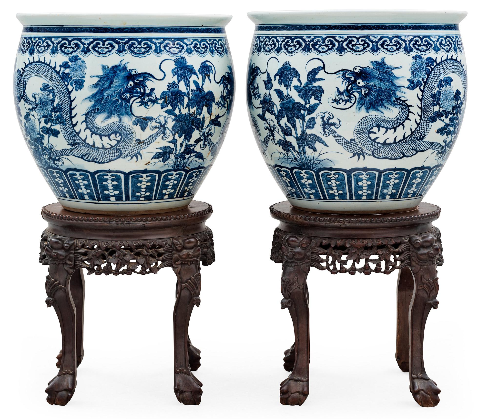A pair of large blue and white fish basins/flower pots, late Qing dynasty, circa 1900.