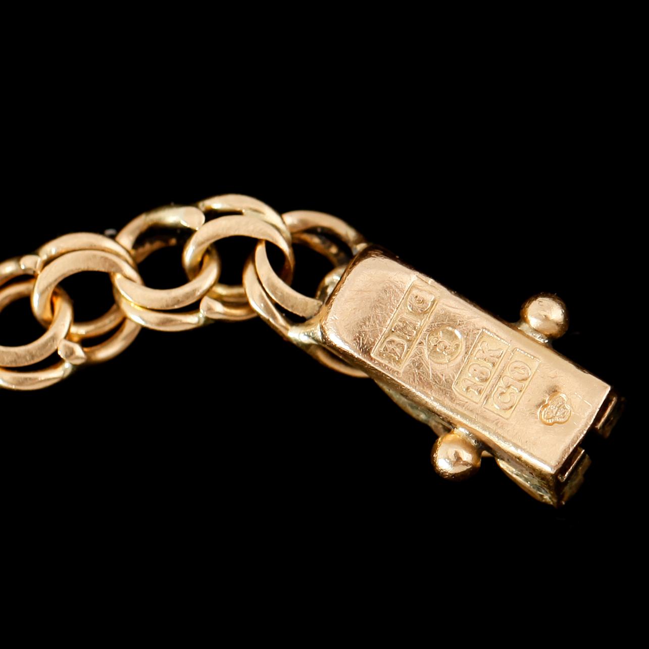 ARMBAND, 18 k guld, 1977. Vikt 9 g.