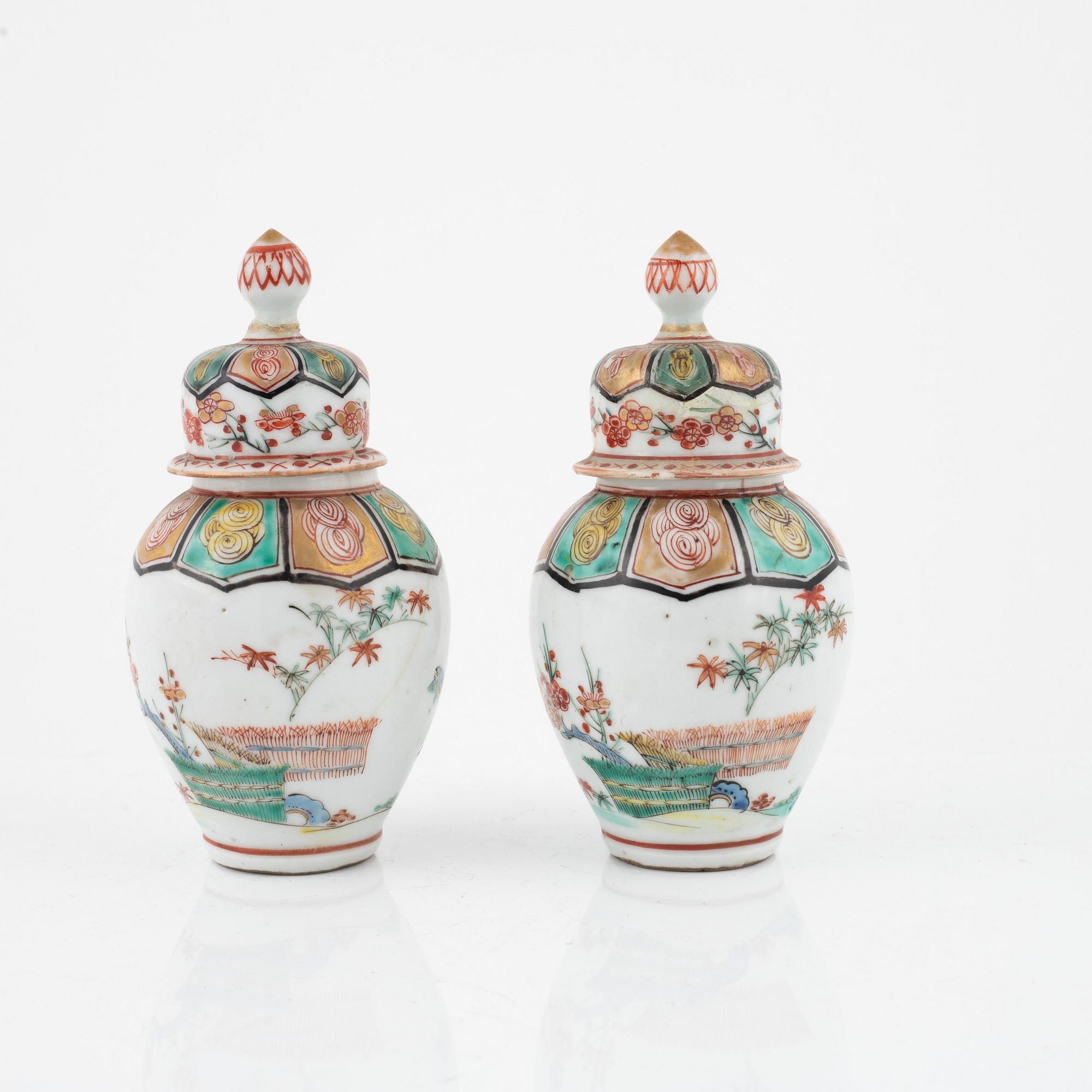 A pair of Japanese jars with covers, circa 1900.