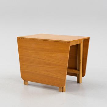 A gate-legged table by Nordiska Kompaniet 1956.