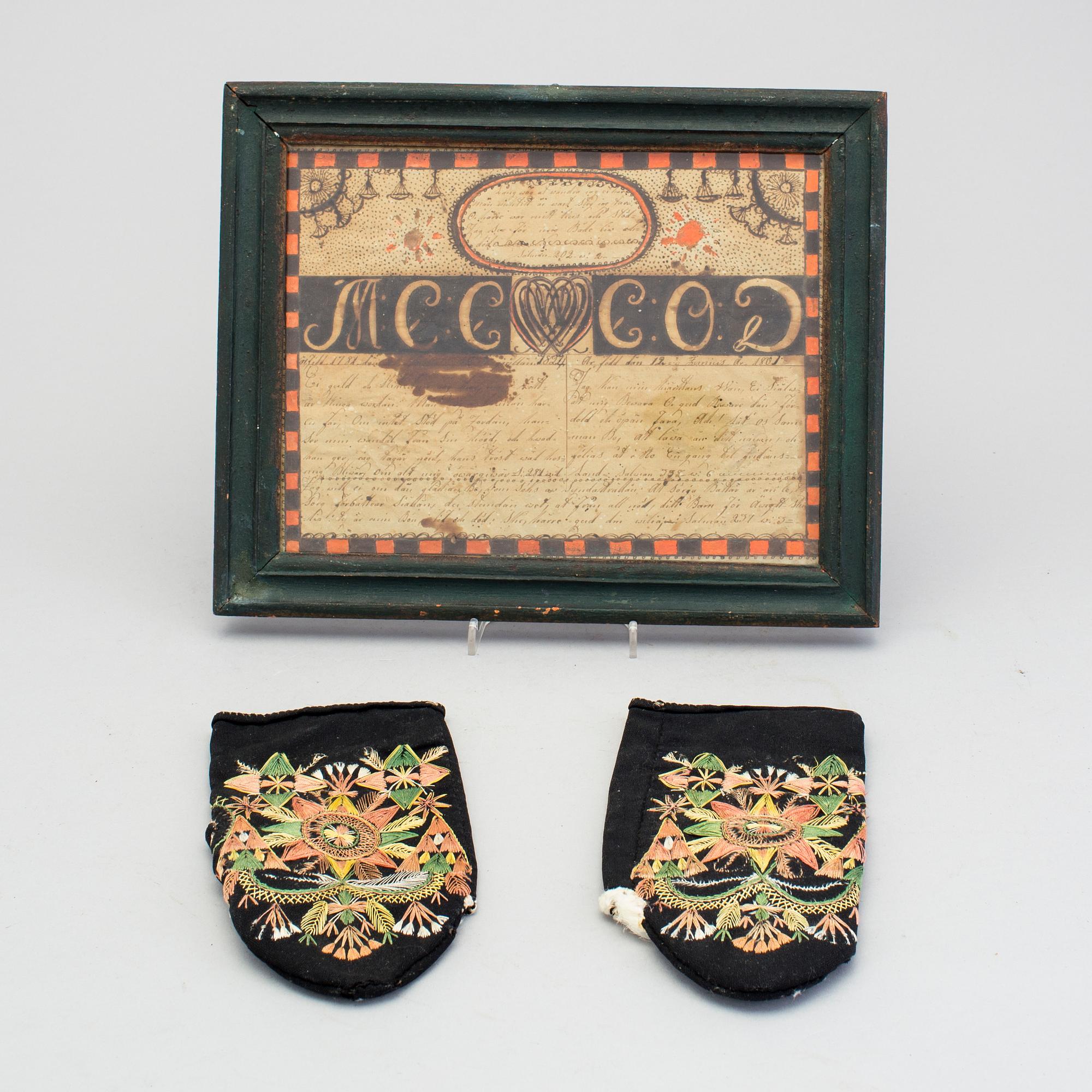 A pair of 19th century folk art brides mittens and a congratulation picture.