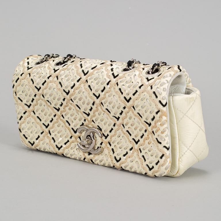 A white Chanel bag, 2010-2011.