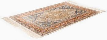 A semi-antique Hereke rug, West Anatolia, c. 135 x 90 cm.