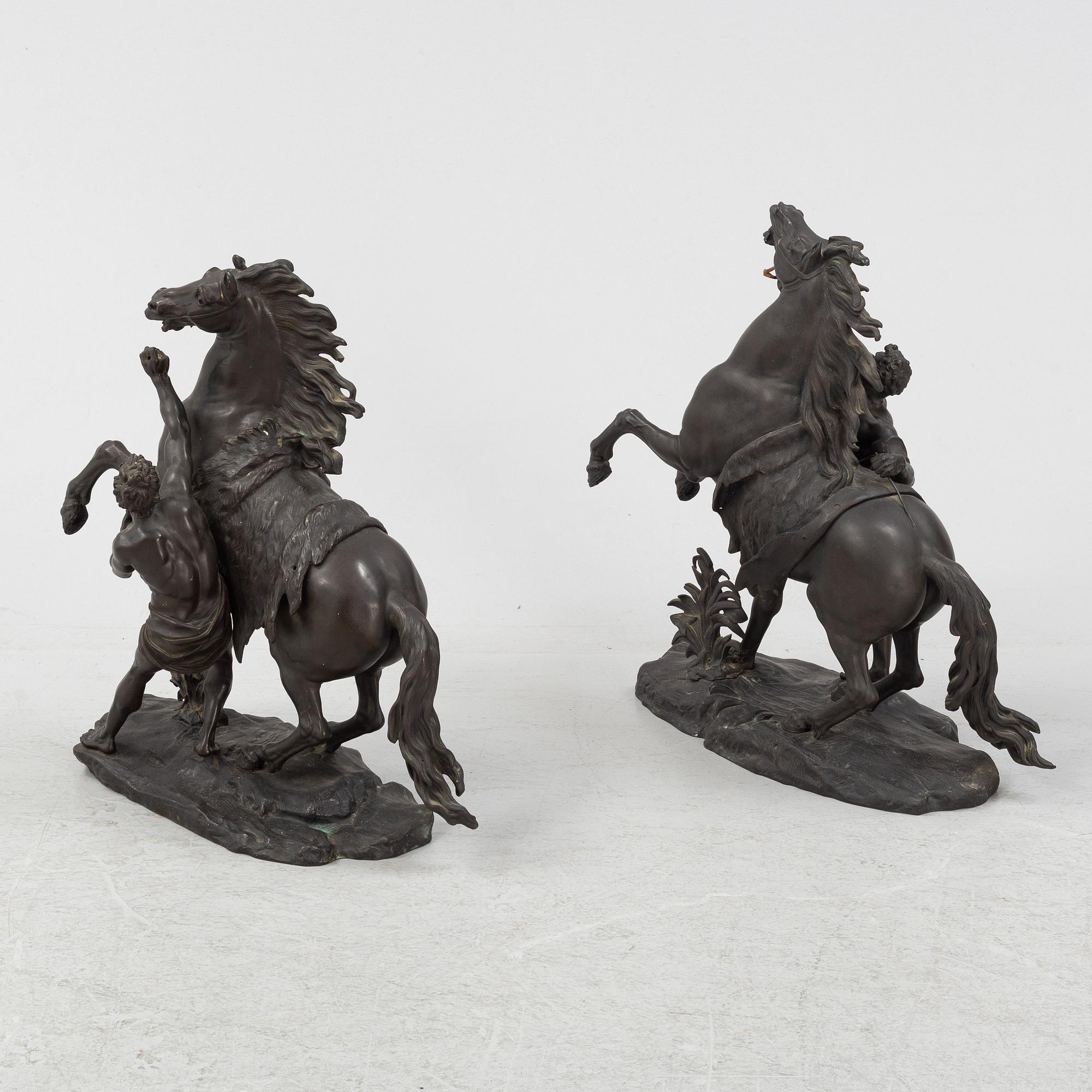 Guilliaume Coustou, after, a pair of bronze sculptures.