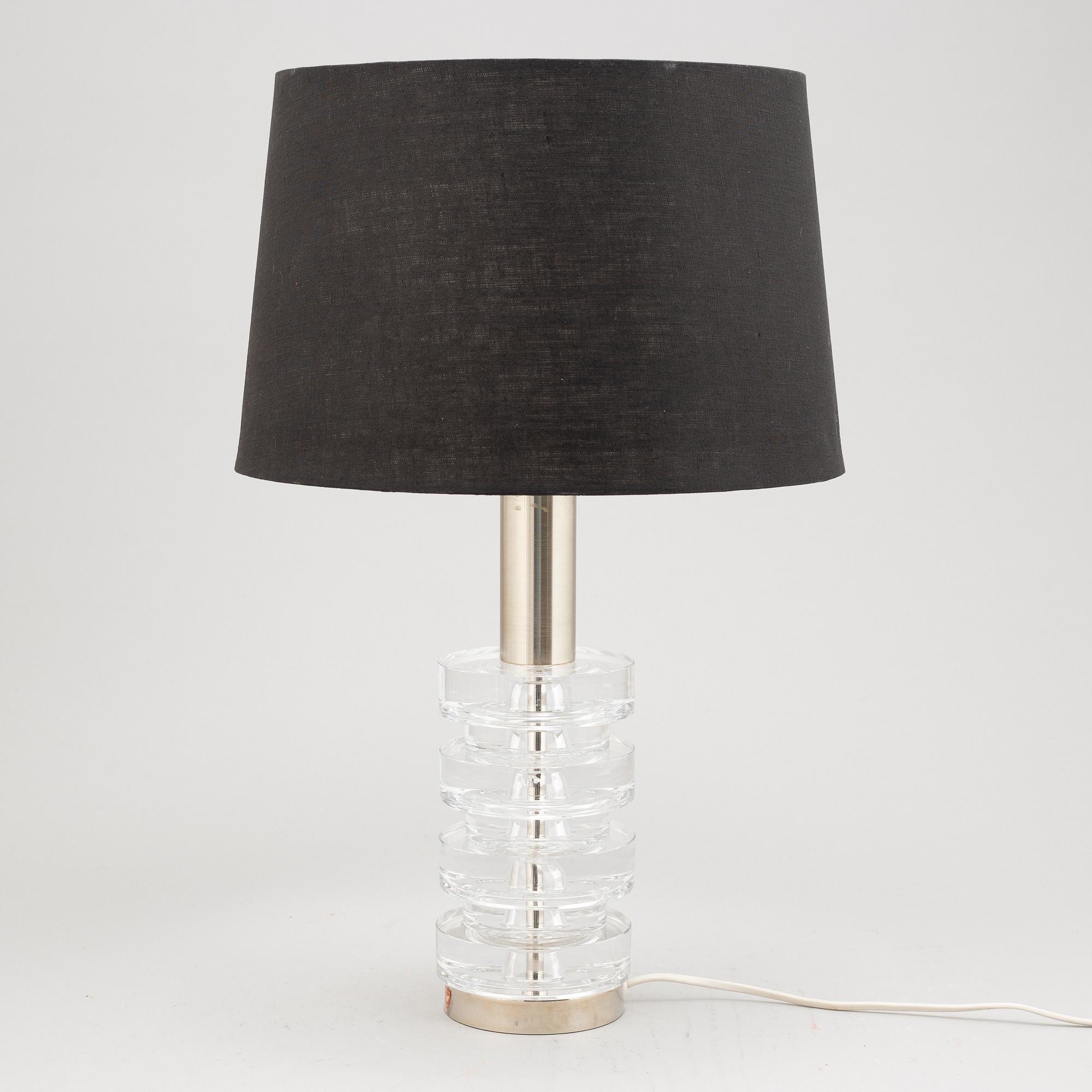 Carl Fagerlund, a glass and metal table lamp, Orrefors, second half of the 20th century.