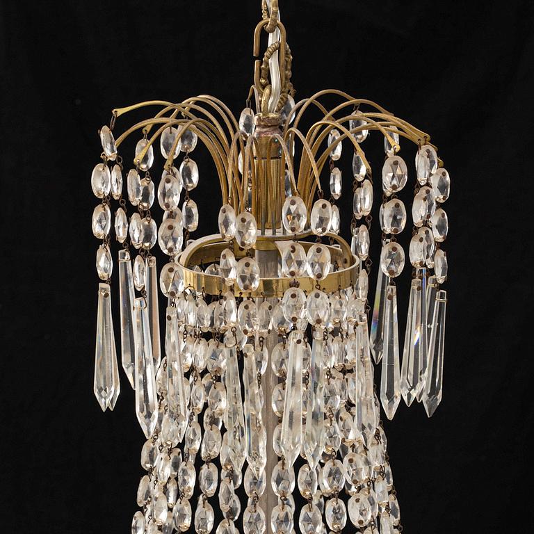 An Empire style chandelier, early 20th century.