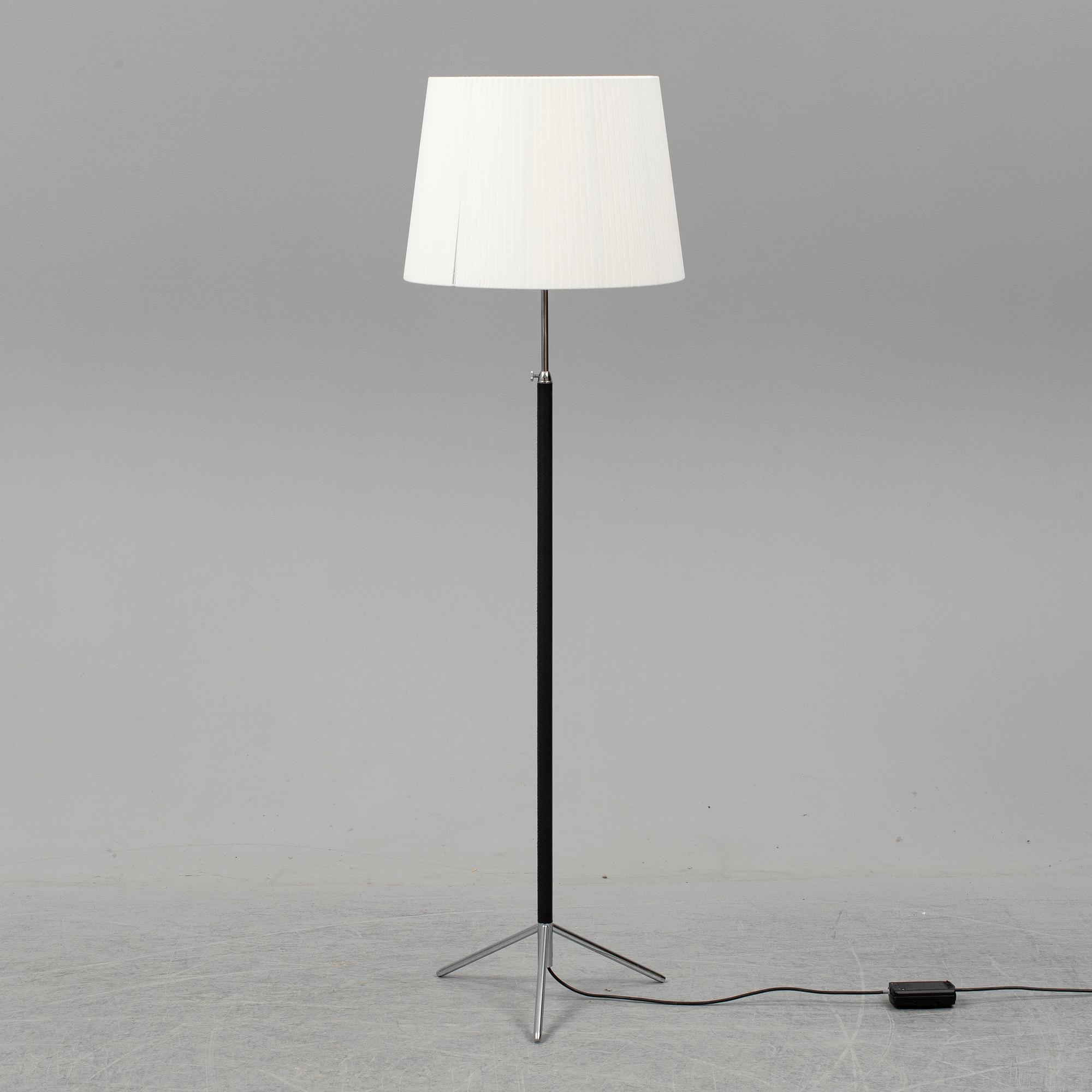 Three contemporary floorlamps by Santa & Cole.