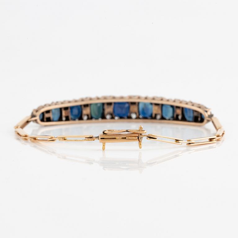 Bracelet 14K gold with dark sapphires and old-cut diamonds.