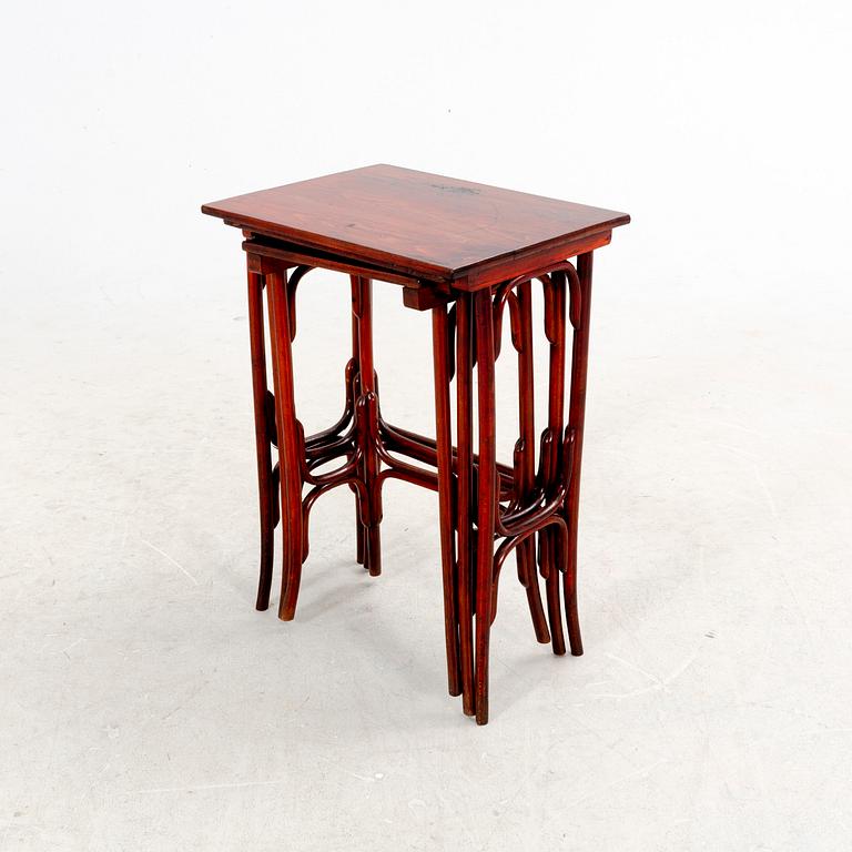 A three-part nesting table first part of the 20th Century.