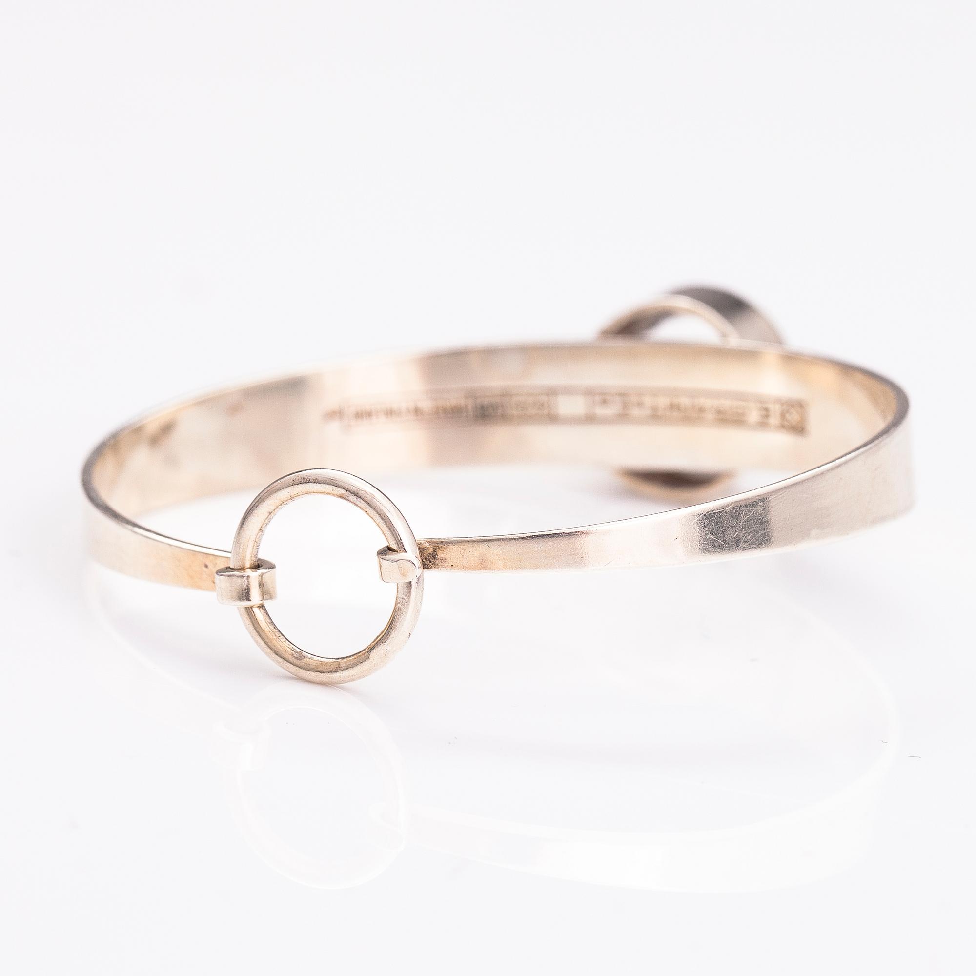 ERIK GRANIT, SORMUS, KAULAKORU ja RANNEKORU, hopeaa ja vuorikidettä. Helsinki 1962-81.