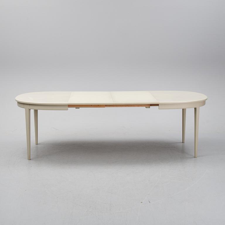 A dining table and six chairs by Carl Malmsten for Bodafors.