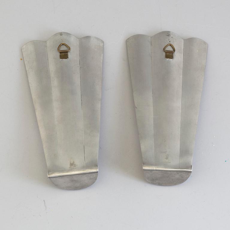 A pair of pewter wall scones, Firma Svenskt Tenn, Stockholm, 1927.