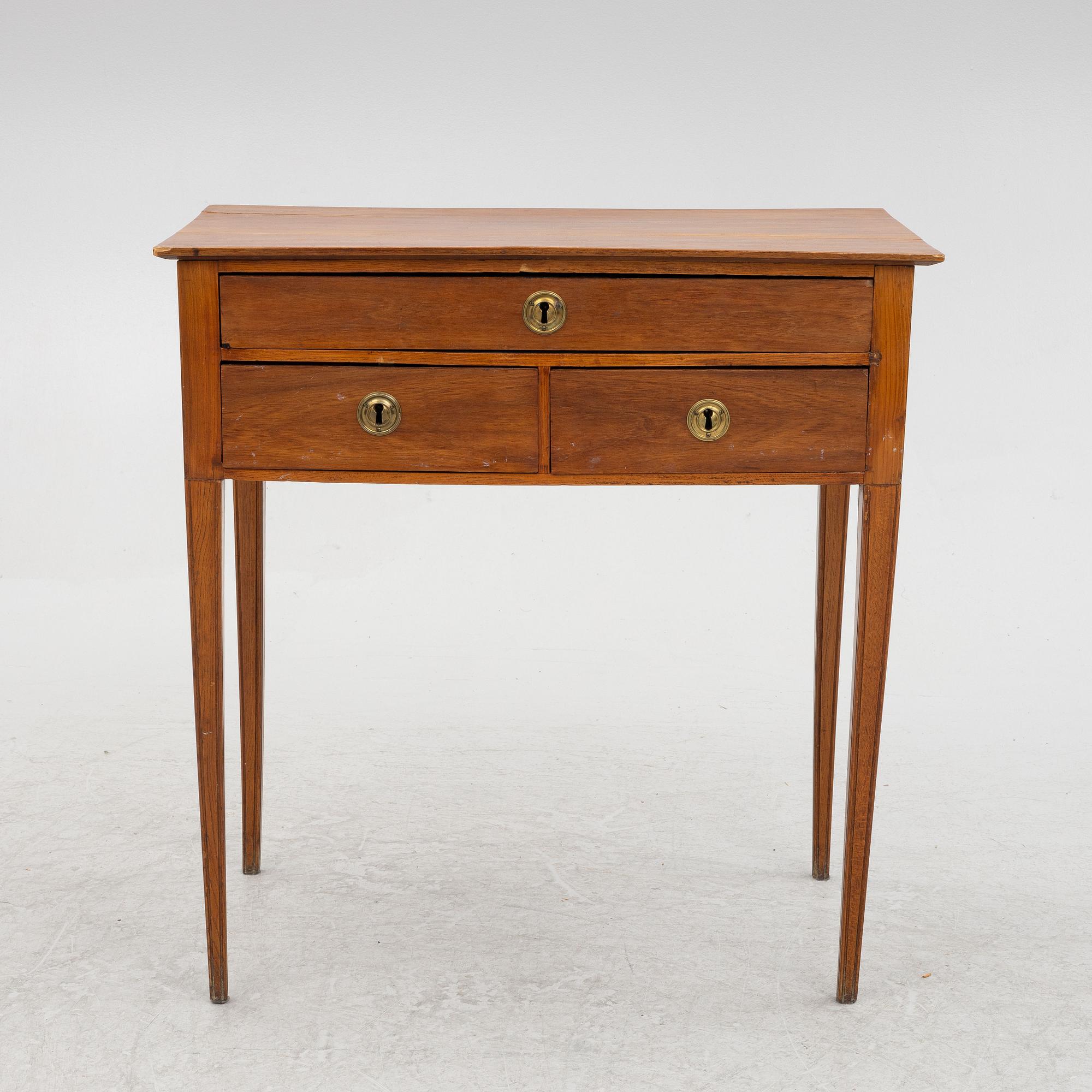A side table with drawers, first half of the 19th century.
