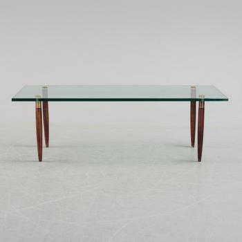 A 1960's glass sofa table.