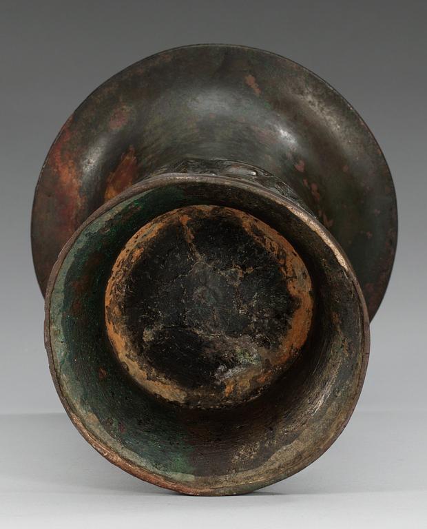 An archaic shaped bronze wine vessel, Tsun, in the style of Shang/early western Zhou style, presumably 17/18th Century.