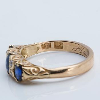 A sapphire and old-cut diamond ring, 1908.