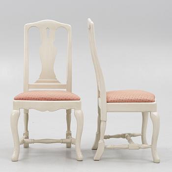 A Rococo style dining table and twelve chairs, KA Roos, Helsingborg, modern production.