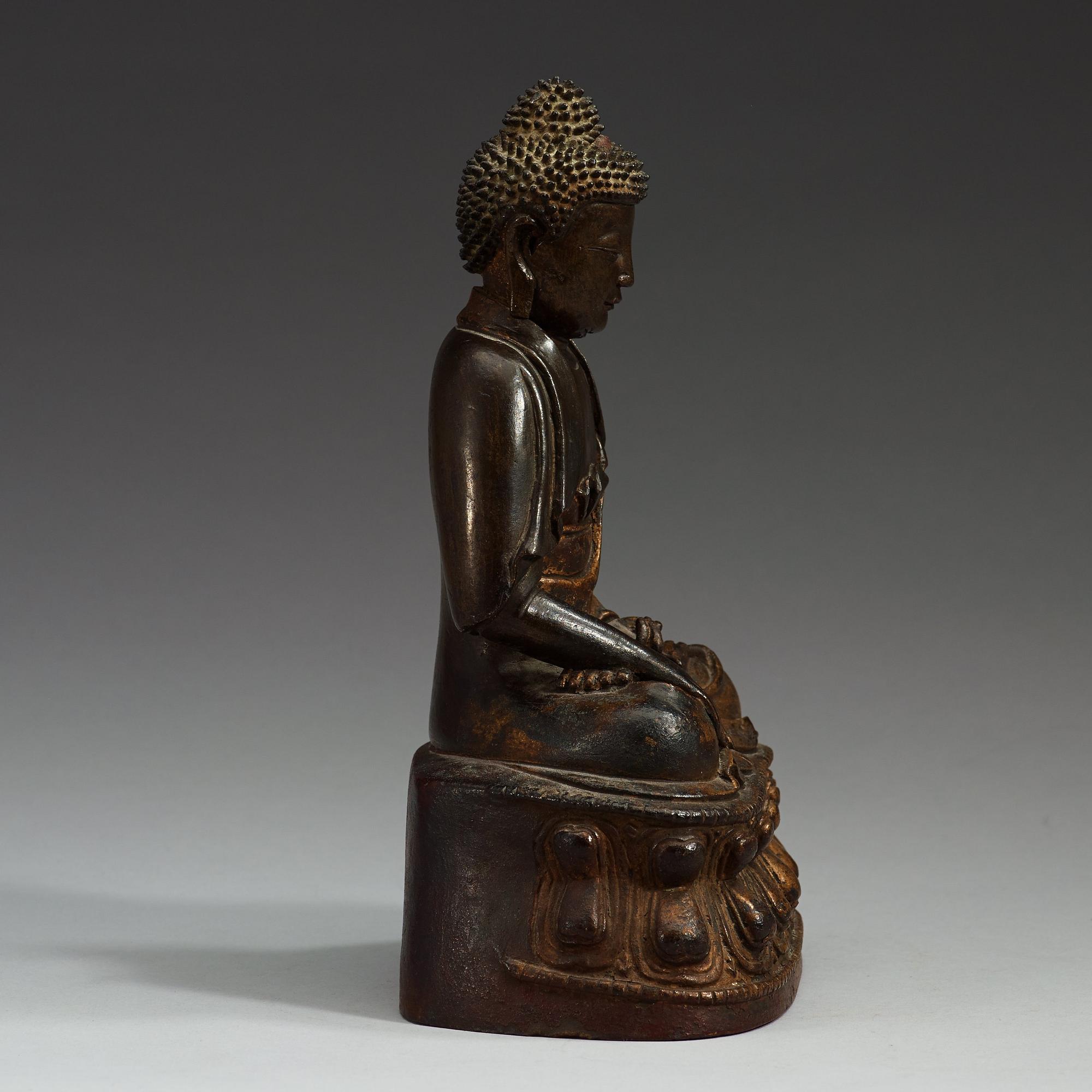 A gilt bronze figure of Buddha Sakyamuni, Ming dynasty (1368-1644).