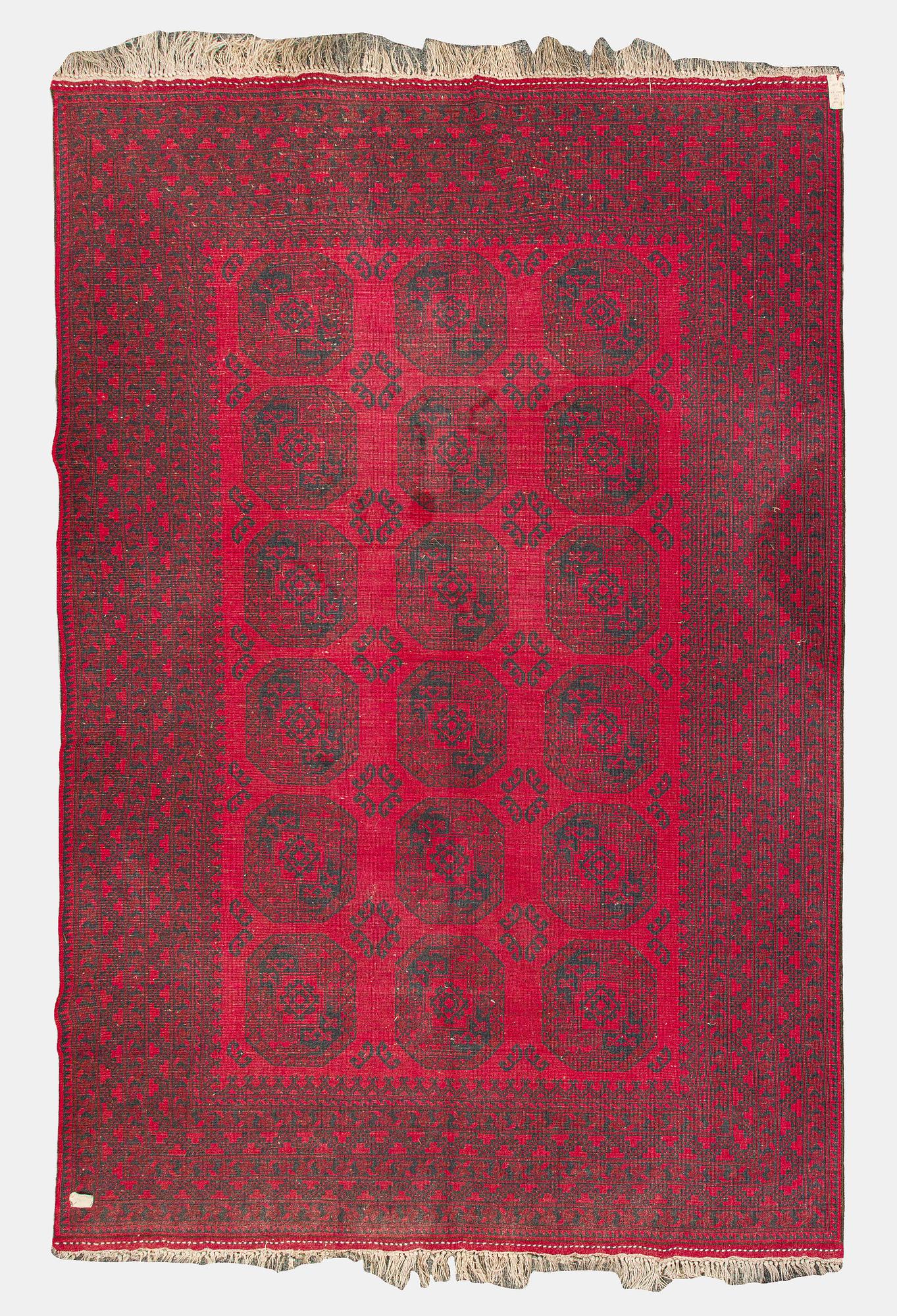 Two Afghan carpets. Ca. 326 x 217 and 88 x 63 cm.