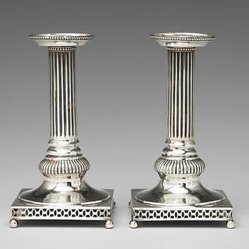 A pair of Swedish 18th century silver candlesticks, mark of Petter Eneroth, Stockholm 1796.