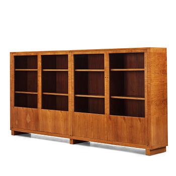 340. Carl Malmsten, a walnut bookcase, Sweden, 1930s.