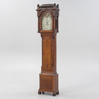 An oak longcase clock, 19th Century.
