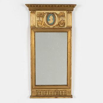 A Gustavian style mirror, early 20th century.