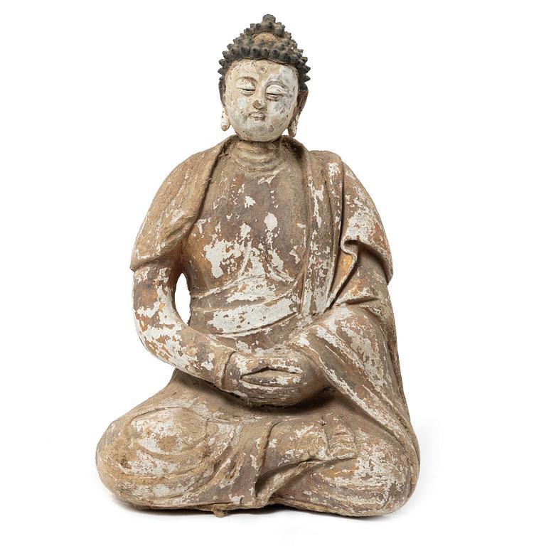 A Southeast Asian figure of a Buddha, 20th century.