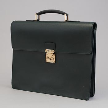 A Louis Vuitton green taiga Ambassador Briefcase.