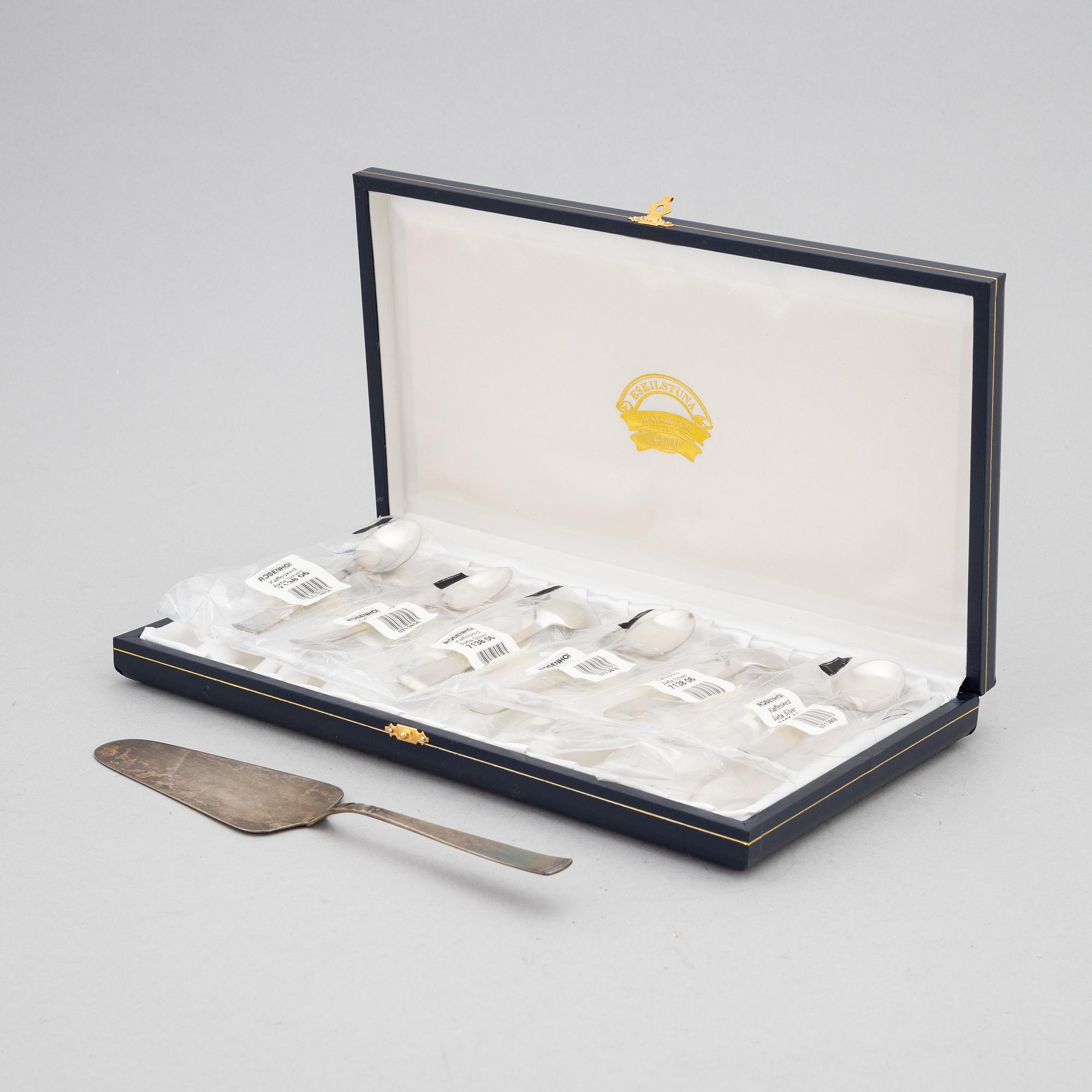 Jacob Ängman, twelve silver spoons and a silver spatula, 'Rosenholm', GAB, 2001-2002.