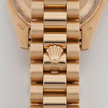 A Rolex Datejust ladie's wristwatch. 18K gold. Automatic. Ø 26 mm. Made circa 2008.