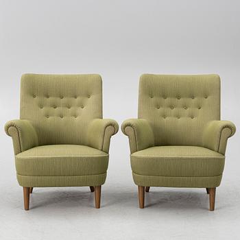 Carl Malmsten, a pair of 'Hemmakväll' armchairs, O.H.Sjögren, Sweden, 1980's.