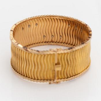 Armband, 18K guld, safirer, smaragd, diamanter ca 0.075 ct  tot. Importstämplat Koruteollisuus Tillander, 1962.