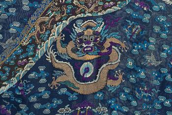 A blue ground summer gauze 'dragon robe' robe, Qing dynasty, circa 1900.