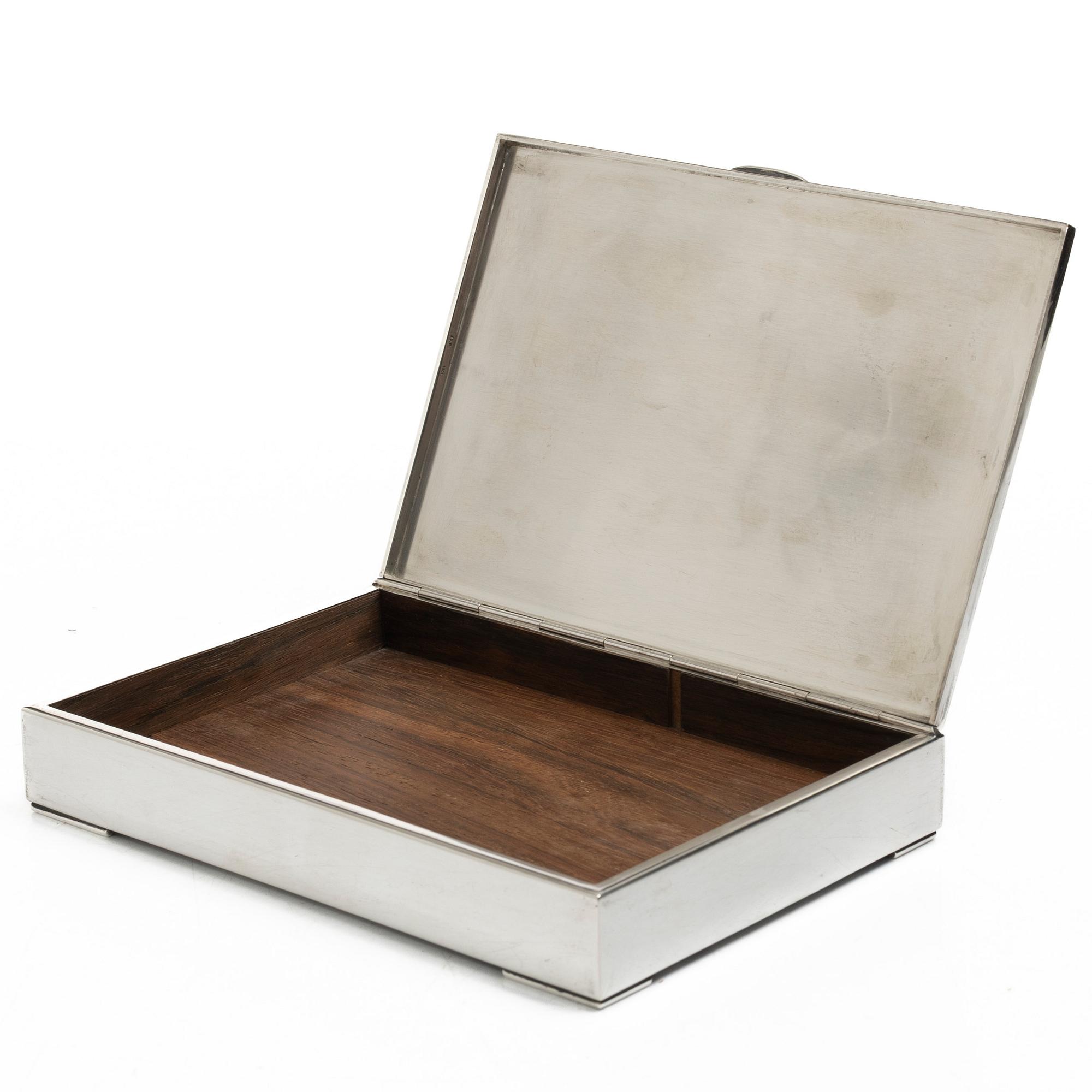 A 20th century sterling silver cigar-box.