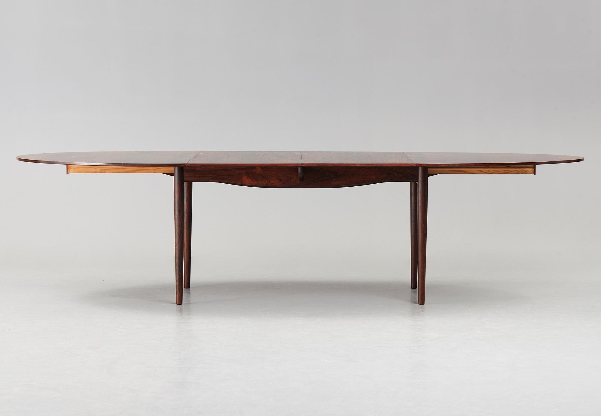 Finn Juhl, A Finn Juhl rosewood 'Judas' dining table, executed by Niels Vodder, Denmark 1960's.