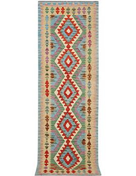A runner carpet, Kilim, c. 287 x 80 cm.