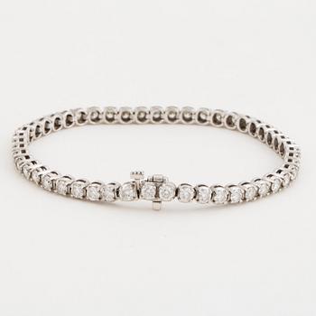 TENNIS BRACELET, 14K white gold with 49 diamonds approx. 5.06 cts.