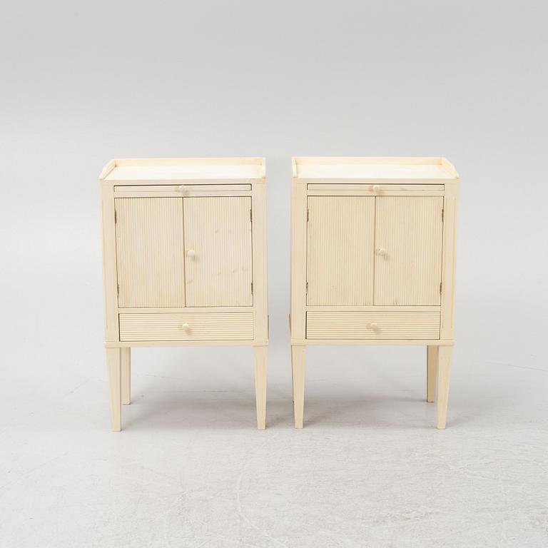 A pair of Gustavian style bedisde tables, end of the 20th century.
