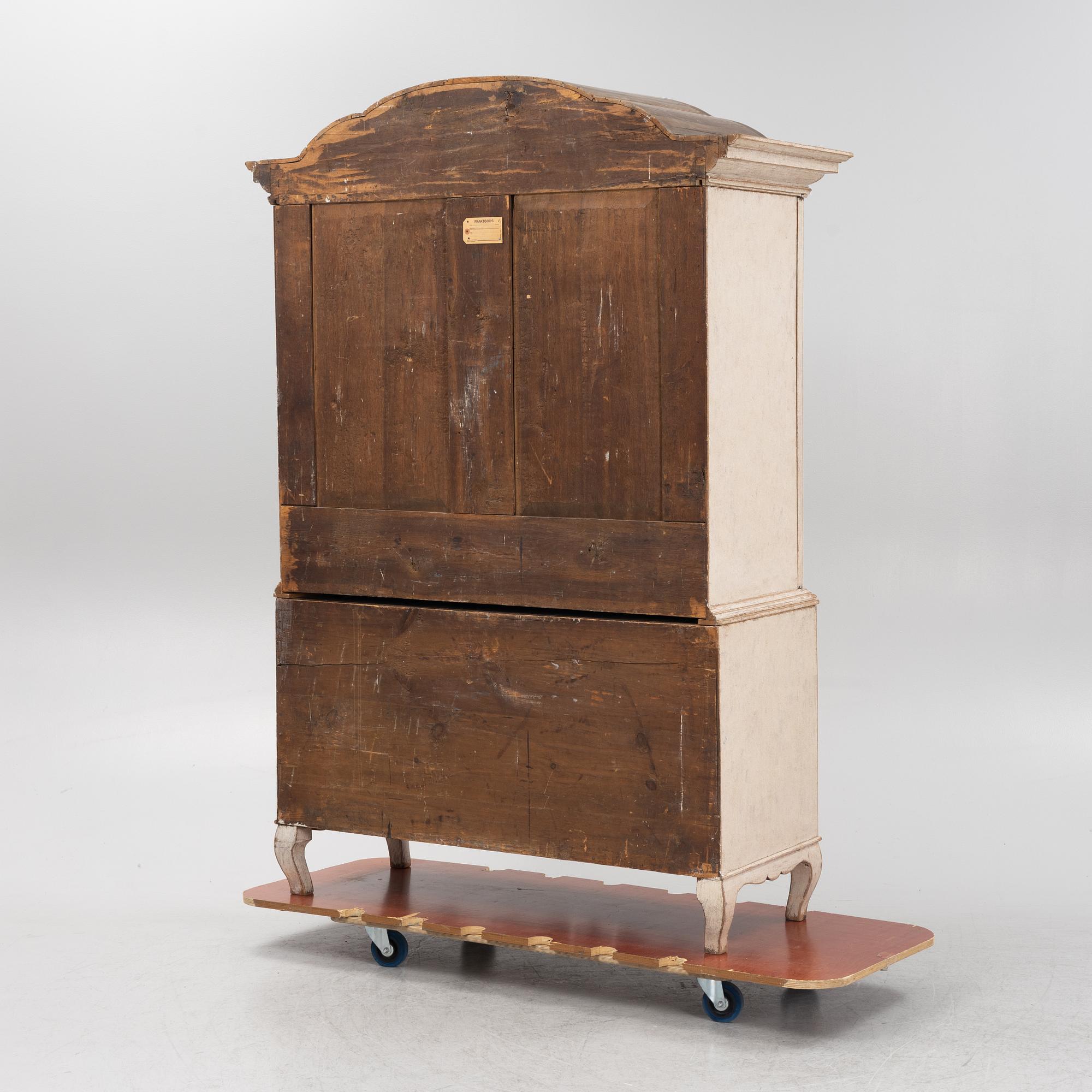 A painted Rococo cabinet, 18th Century.