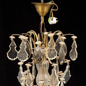 A Rococo style chandelier, mid 20th Century.